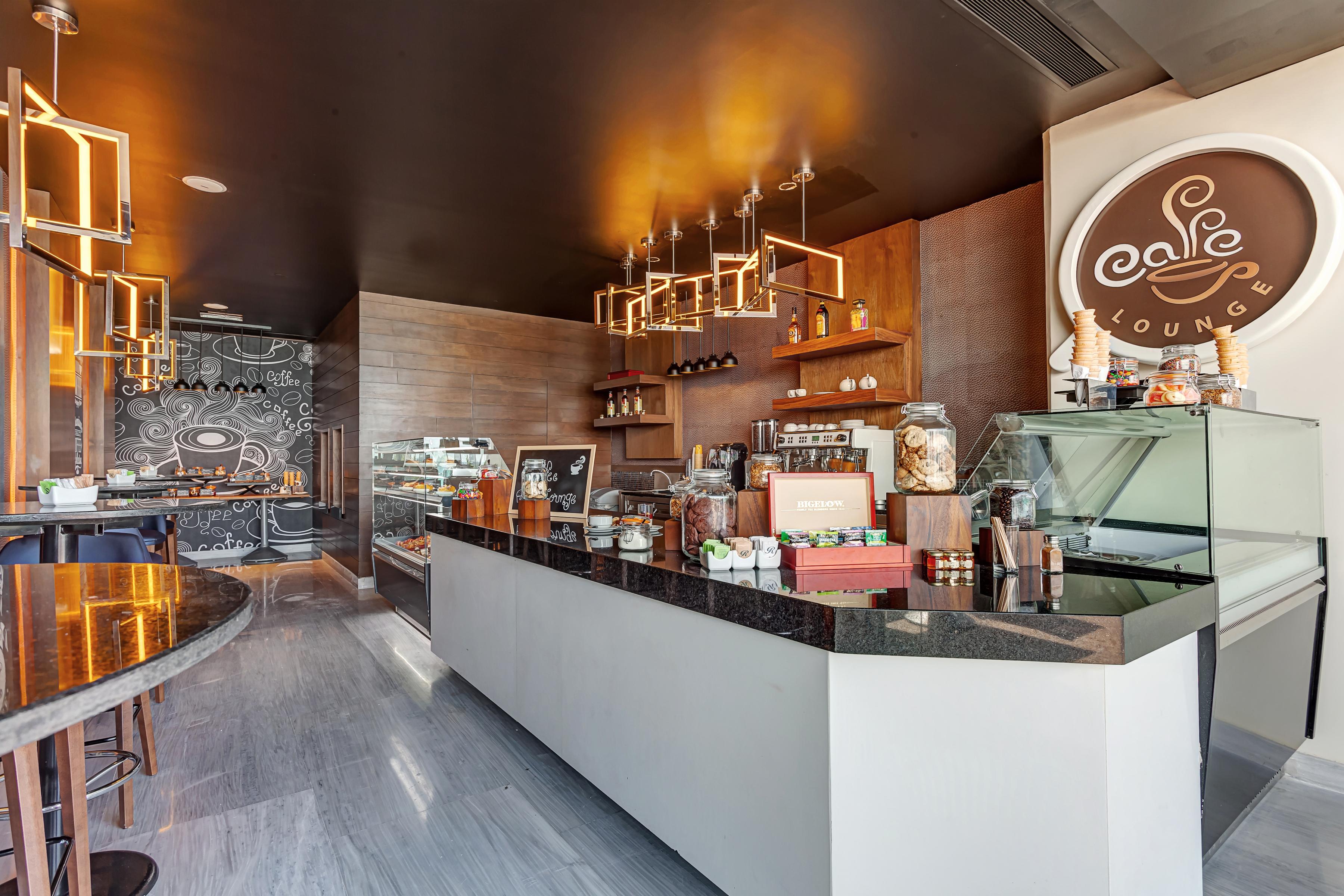 Royalton Chic Cancun, An Autograph Collection All-Inclusive Resort - Adults Only Bagian luar foto The interior of a typical café
